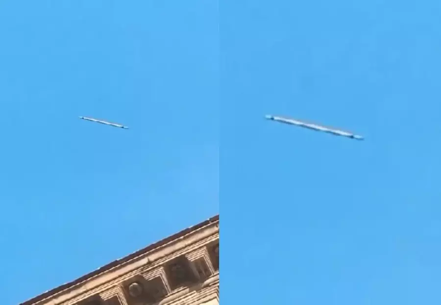 Сигарообразный корабль НЛО, парящий над Италией 18 s86530445